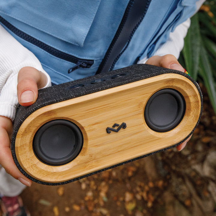 House of Marley Get Together 2 Mini Bluetooth Speaker - In the model's hands